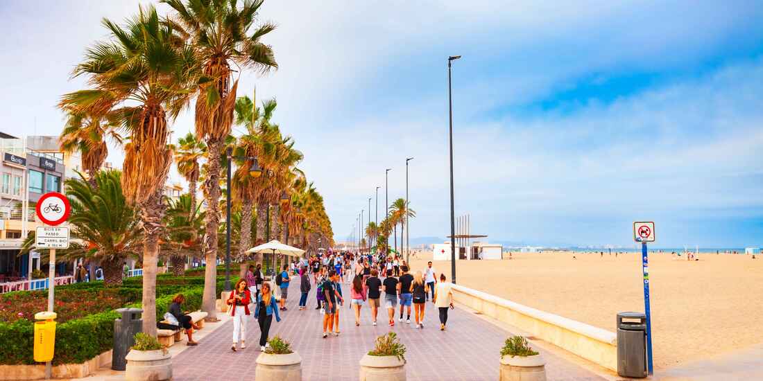 Strolling along Spain&rsquo;s sun-kissed promenades--where golden sands meet lively streets, palm trees sway in the breeze, and every step feels like a postcard moment.