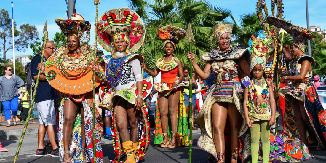 People in traditional colorful costumes celebrating a cultural festival in Martinique