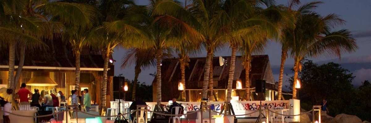 Evening beachfront event at a tropical destination resort